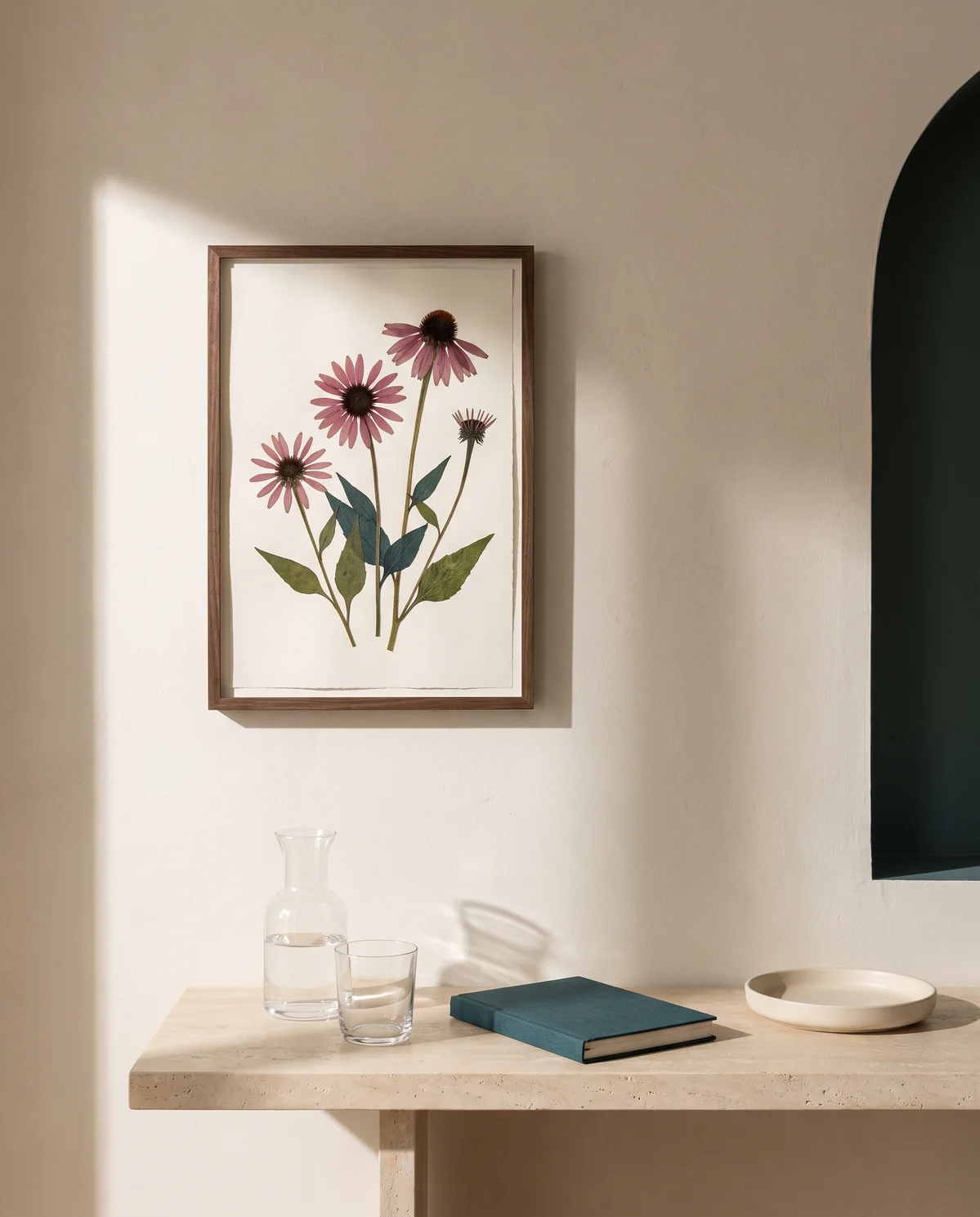 Private Backroads Beauty room with pressed echinacea artwork, water, and a journal in warm natural light